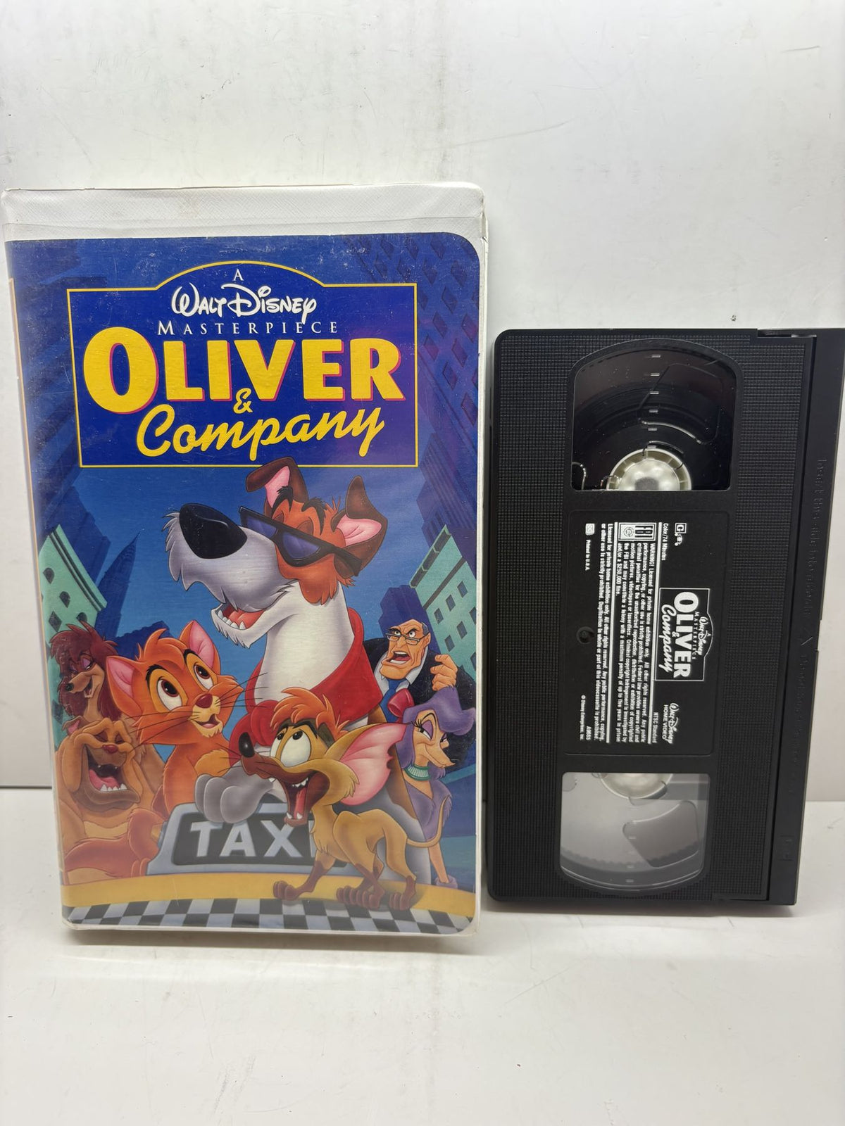 Oliver & Company VHS front cover and cassette