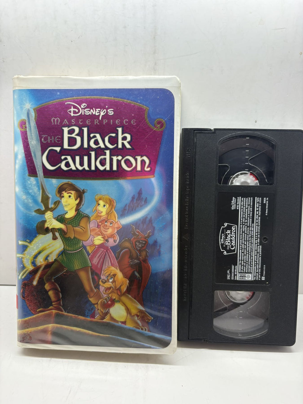 The Black Cauldron – Masterpiece Collection VHS front cover and cassette